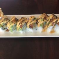 Dragon Roll · Shrimp tempura roll, eel and avocado on top.