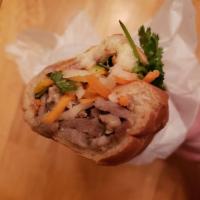 Vietnamese Banh Mi Sandwich ·  Freshly baked baguette filled with pork liver pate, French butter, coriander, cucumber, pic...