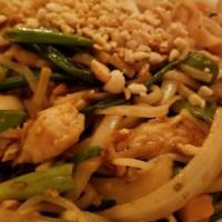Pad Thai · Flat rice noodles, eggs, peas, carrots, bean sprouts, onions and peanuts.