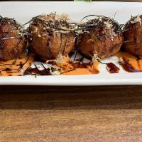 Takoyaki · 5 piece octopus balls seared with our aioli and sweet soy glaze.
