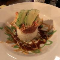 Tuna Tower · Tower molded sushi rice, spicy crab mix, avocado and spicy tuna mix topped with micro greens...