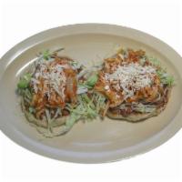 Sope · Traditional Mexican dish with thick corn cake deep fried with choice of beans, choice of mea...