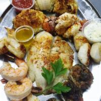 Stuffed Broiled Seafood Combo · Shrimp, crab cake, flounder, mushroom, and clams casino.