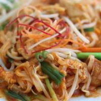 Pad Thai · Stir fried thin rice noodles, tofu, eggs, onions, scallions, bean sprouts, and crushed peanu...
