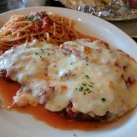 Chicken Parmigiana · Topped with marinara and finished with baked mozzarella.