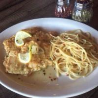 Chicken Francese · Chicken breast in a lemon and white wine sauce.