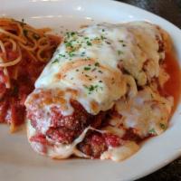 Eggplant Parmigiana · Topped with marinara and finished with baked mozzarella.