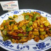 Kung Pao Chicken · Stir fried spicy chicken with vegitables and peanuts, comes with side of steamed rice or fri...