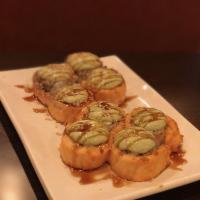 Exorcista Roll · Krab, cream cheese, avocado and salmon baked; and topped with sweet sauce and cilantro sauce