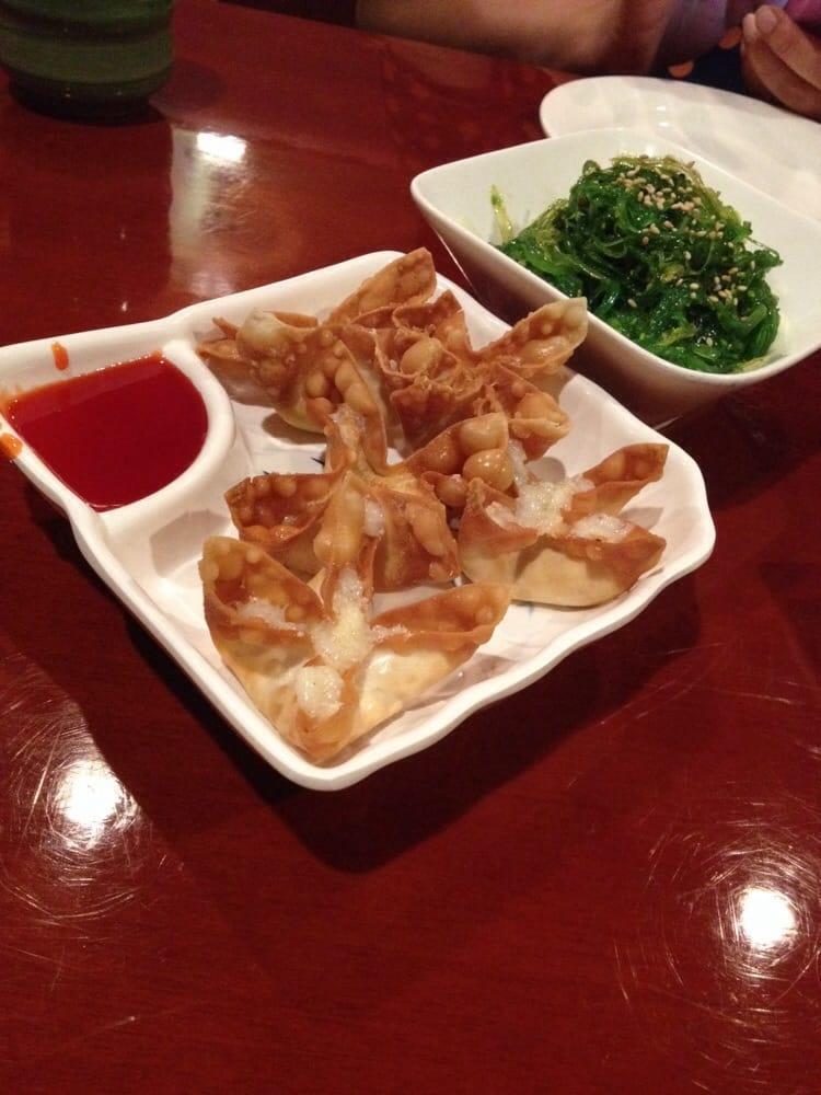 Crab Rangoon · 5 pieces. Imitation crab stick, cream cheese, onion, and pineapple wrapped in fried wonton. Served with sweet and sour sauce.