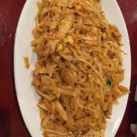 Pad Thai ·  Stir fried rice noodles with pad Thai sauce, egg, bean sprouts, green onion and crushed pea...