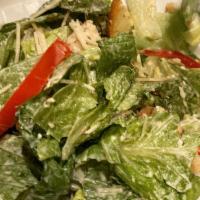 Caesar Salad · romaine, Caesar dressing, Romano cheese and housemade croutons. Add chicken or shrimp for an...