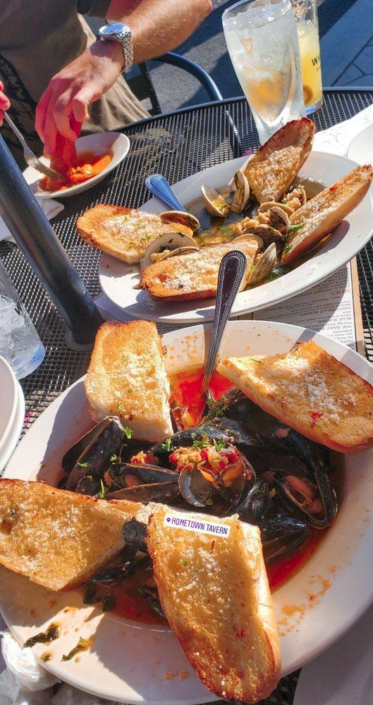 Zuppa Vongole · A large bowl of fresh native littlenecks in a garlic lemon herb cam sauce, your choice of red or olio sauce. Served with crostini.