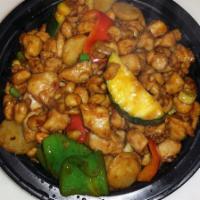 Kung Pao Chicken · Celery, carrots, water chestnuts, zucchini and peanuts. Spicy.
