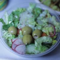 Fattoush Salad · Romaine, radish, olives, tomatoes, cucumbers, onions, sumac, lemon dressing and olive oil.