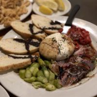 Burrata · Prosciutto, asparagus, roasted red peppers, 18 year balsamic, truffle oil.