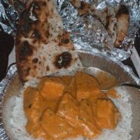 Chicken Tikka · Chicken Tenders, Marinated in yogurt, ginger, garlic, tandoori spices, and served over onion...
