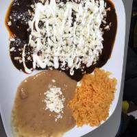 Enchiladas · Filled with chicken or cheese. Topped with one of our salsas or beans, onions, sour cream an...