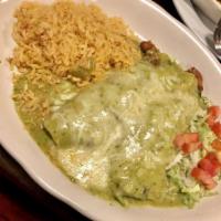 Chicken Enchiladas · Corn tortillas filled with seasoned chicken topped with a choice of jalapeño sauce, mole sau...