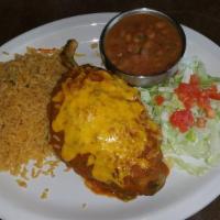 Chile Relleno · Poblano pepper stuffed with ground beef and cheese, deep-fried, topped with ranchero sauce a...