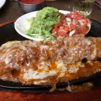 Steak Ranchero · Seasoned charbroiled skirt steak topped with ranchero sauce and Monterey Jack cheese and gua...