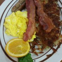 The Heights Pancake Combo · 2 pancakes. 2 eggs. 2 bacon. 2 sausages and hashbrowns.