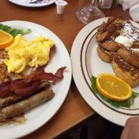 The Heights French Toast Combo · 2 French toast. 2 eggs, 2 bacon, 2 sausages and hashbrowns.