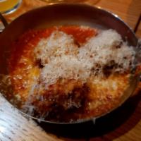 Meatballs · Pork and ground beef meatballs, Manchego cheese, tomato sauce
