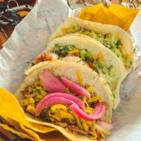 Ground Beef Taco · Seasoned ground beef, cheddar, chop mix with a choice of soft flour tortilla or crunchy corn...