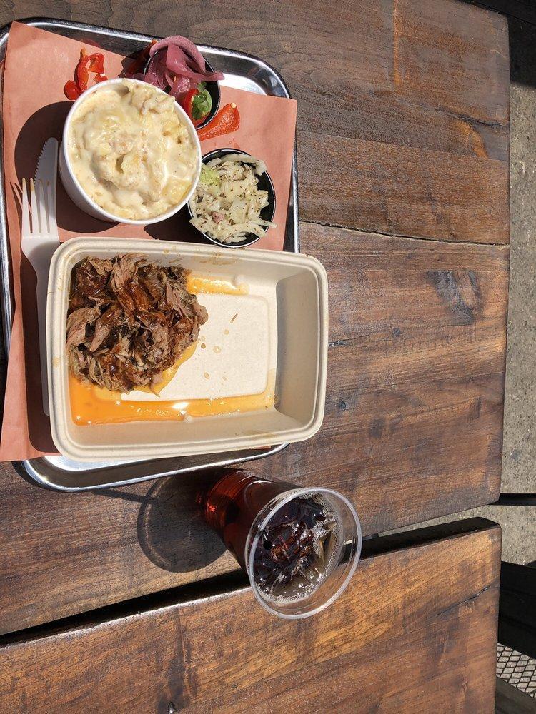 Pulled Pork · Hand-pulled, slow-smoked pork shoulder glazed with our house-made BBQ Sauce. Served with an optional assortment of pickled veggies & slaw.