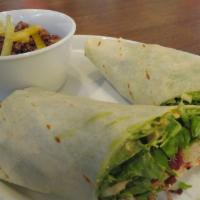 Clubhouse Wrap · House roasted turkey, bacon, lettuce, sprouts, tomatoes, avocado mash and harissa crema..