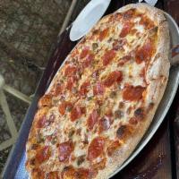 Meat Lovers Pizza · Mozzarella, pepperoni, ham, bacon, sausage.