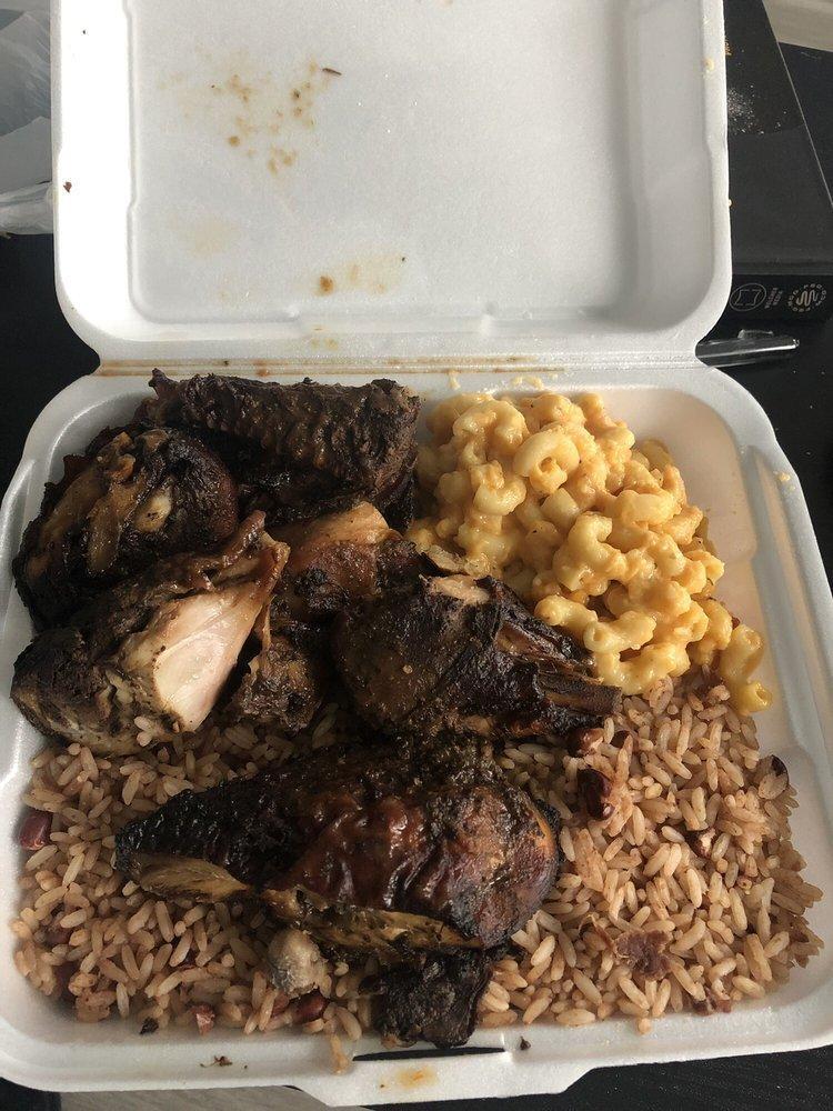 Jerk Chicken · Spicy Jerk Chicken, served with rice/beans and your choice of one side 