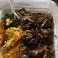Ox Tails Specialty · Mild Jamaican Oxtails, served with Rice/Beans and your choice of one side