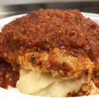 Lasagna · Our homemade lasagna is built with layers of imported and domestic cheeses and topped with y...