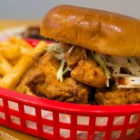 Zinger Burger · Hand battered crispy chicken tenders, topped with homemade spicy ketchup and fresh coleslaw.