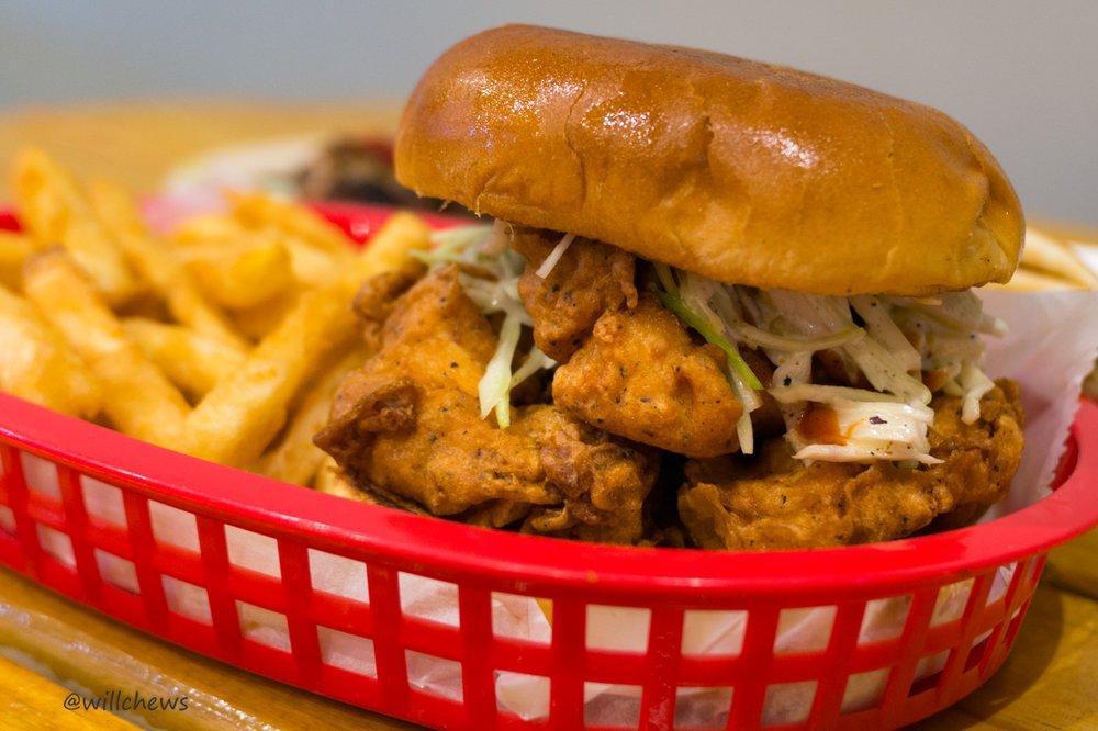 Zinger Burger · Hand battered crispy chicken tenders, topped with homemade spicy ketchup and fresh coleslaw.