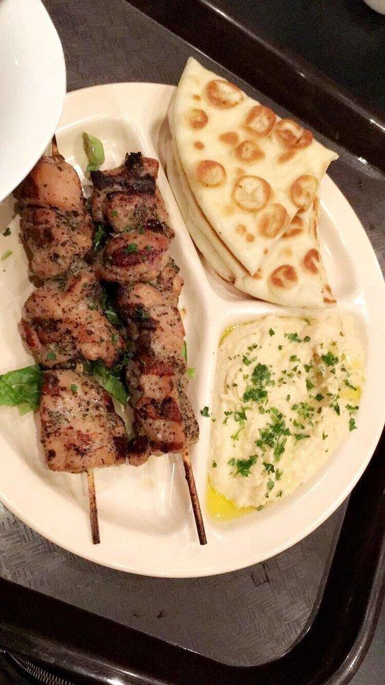 Mediterranean Chicken Kabab Platter · Tender pieces of chicken marinated in Italian herbs served over lettuce with fresh made hummus and butter sauteed pita bread.