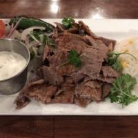 Istanbul Doner · Seasoned ground lamb slowly cooked on a vertical rotisserie, shaved and served with homemade...