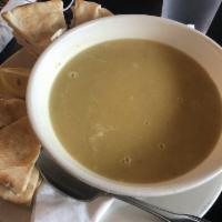 Lentil Soup · Vegetarian lentil cream. Served with warm pita bread and your choice of dressing.