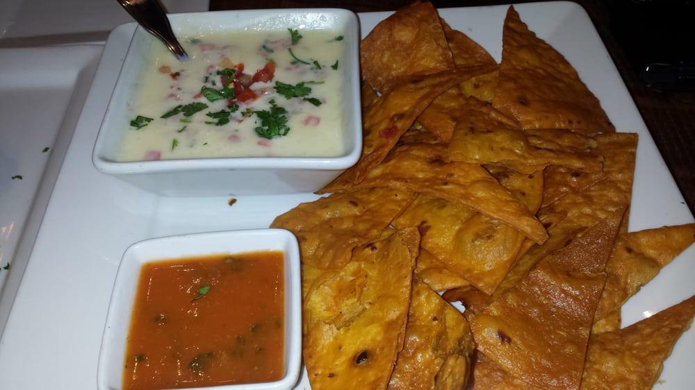 Dinner Queso Blanco · Served with jalapeno cheddar tortilla chips, pico de gallo and queso fresco.