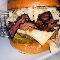 Pastrami Burger · Pickles, house slaw, pepper jack cheese and spicy mayonnaise. Served with fries.