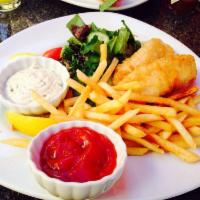 Fish and Chips · Stella Artois battered tilapia, shoestring fries, tartar sauce and mixed green salad.