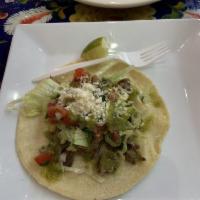 Tacos · Onion and cilantro 