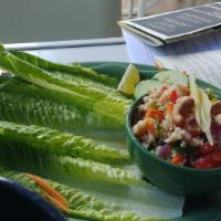 Lettuce Wraps · Thai style. Minced chicken, crispy tilapia, or steamed tofu with lime, chili, ginger, and ca...