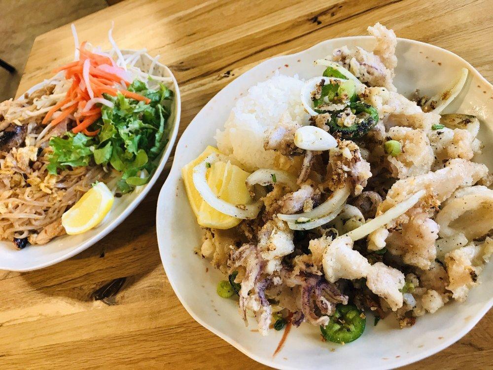 Pad Thai · Small flat rice noodles are wok-tossed with scrambled eggs. Garnished with pickled daikon and carrots, bean sprouts, and fresh cut lemons. Gluten free.