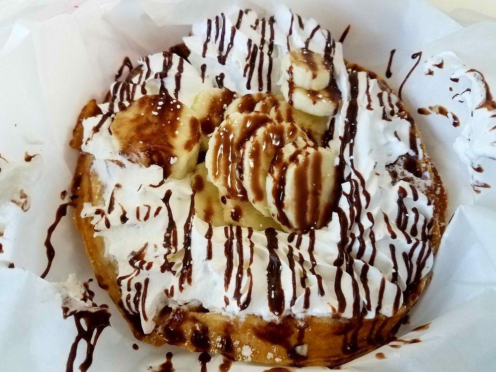 Banana & Nutella Waffle · Belgian waffle topped with fresh cut bananas, whip cream and a drizzle of nutella. 
