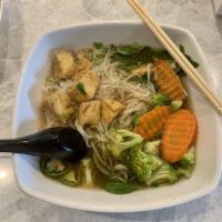 Pho Dau Hu Chien · Rice noodle beef or chicken soup with fried tofu.