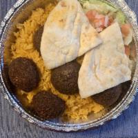 Falafel Platter · Served with rice, pita bread and salad.