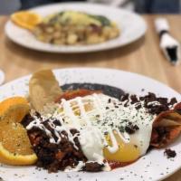 Zinnia's Spicy Chilaquiles · Two eggs any style, tortilla chips in our home made salsa Rosa or verde, pepper jack cheese,...